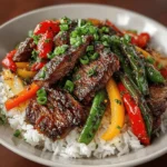 Stir-fries have long been celebrated in home cooking for their versatility, speed, and the ability to create a wholesome meal in a matter of minutes. With their vibrant colors and a medley of flavors, stir-fries not only appeal to the taste buds but also to the practicalities of busy lifestyles. One dish that stands out in the realm of quick meals is the Savory Homestyle Beef and Vegetable Stir-Fry. This recipe encapsulates everything we love about stir-frying: it’s nutritious, quick to prepare, and packed with an enticing balance of flavors and textures.